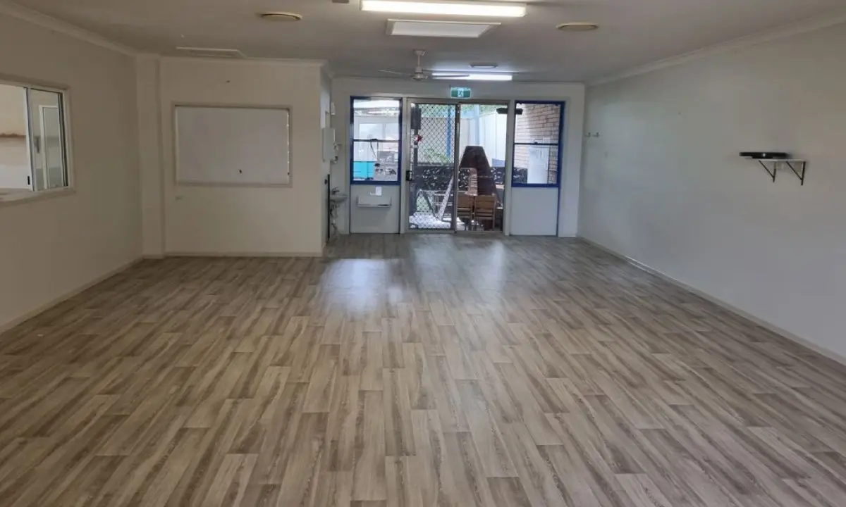 Rebuilt playroom with new vinyl plank flooring after flood recovery, Crestmead early learning centre