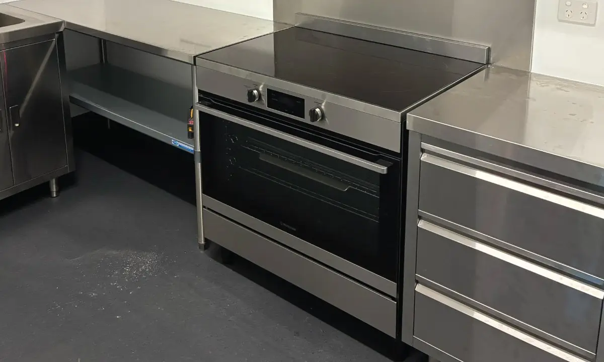 New commercial kitchen with stainless steel benches and oven, Point Vernon