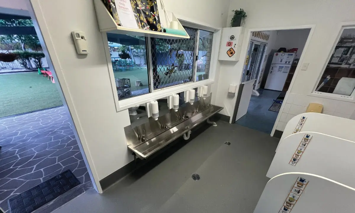 Rebuilt childcare bathroom with new wall linings and stainless steel trough, Logan Reserve