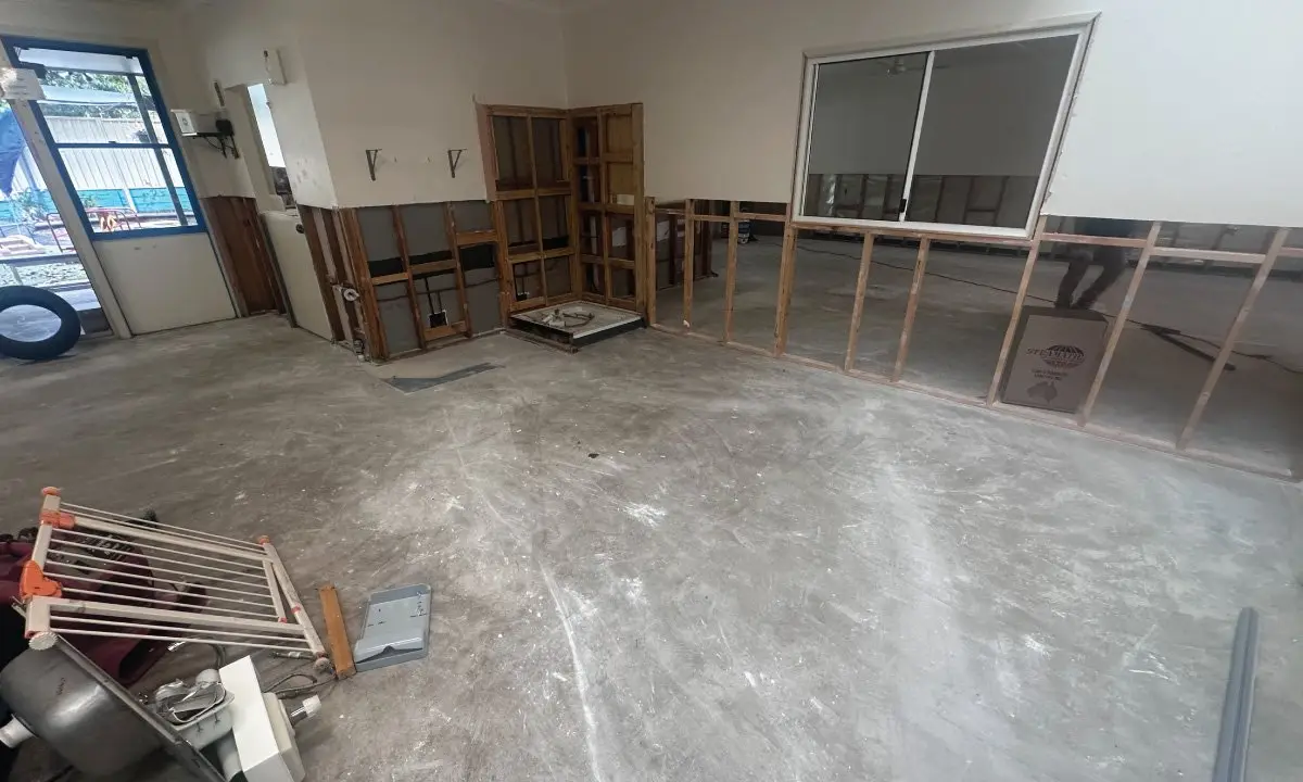 Playroom stripped to the concrete slab after flood damage, Crestmead