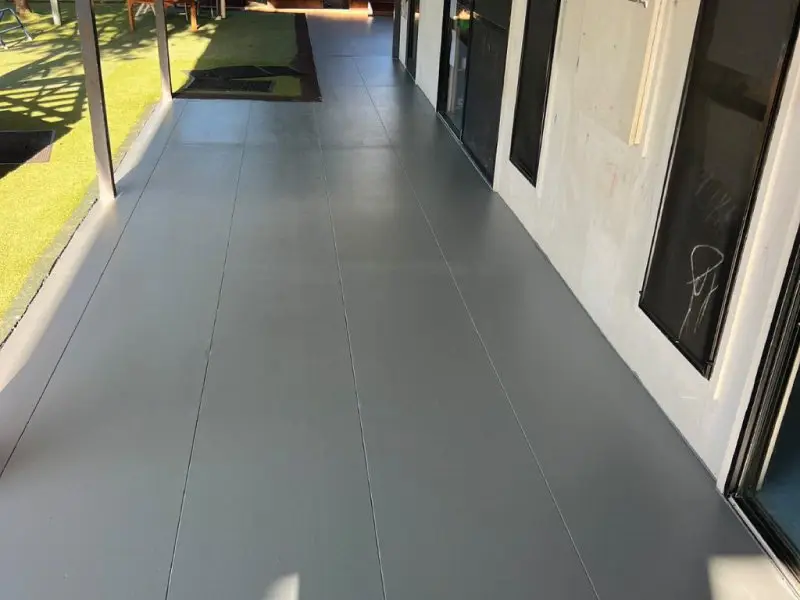 Long run of the new tiled verandah along the building