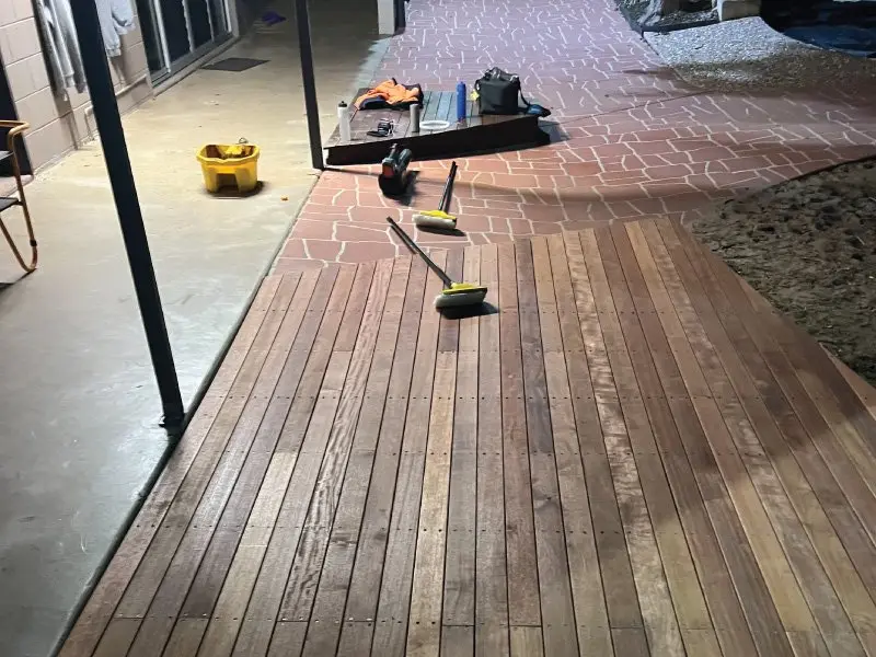 Hardwood boards being fixed on the new frame