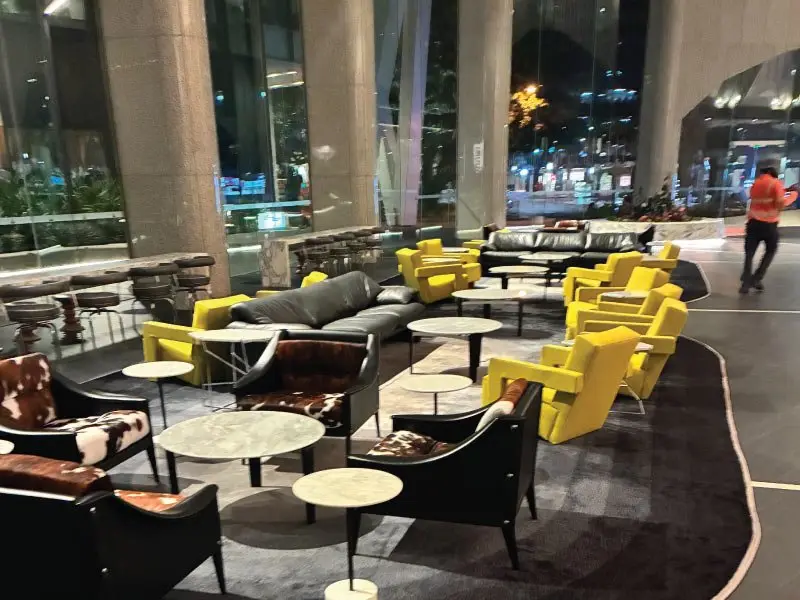 Foyer lounge at night with the works complete