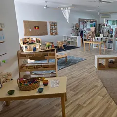 Refurbished childcare playroom with timber furniture and new vinyl plank flooring