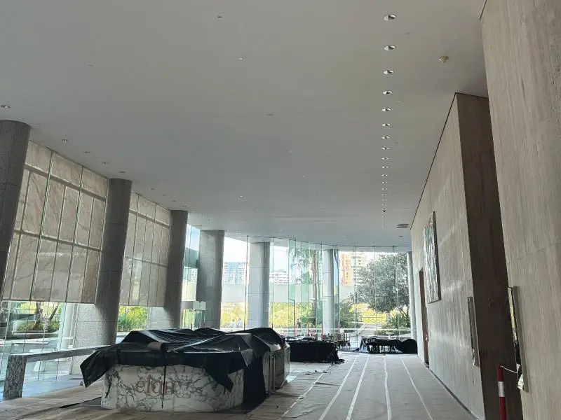 Foyer furniture covered for protection during the works