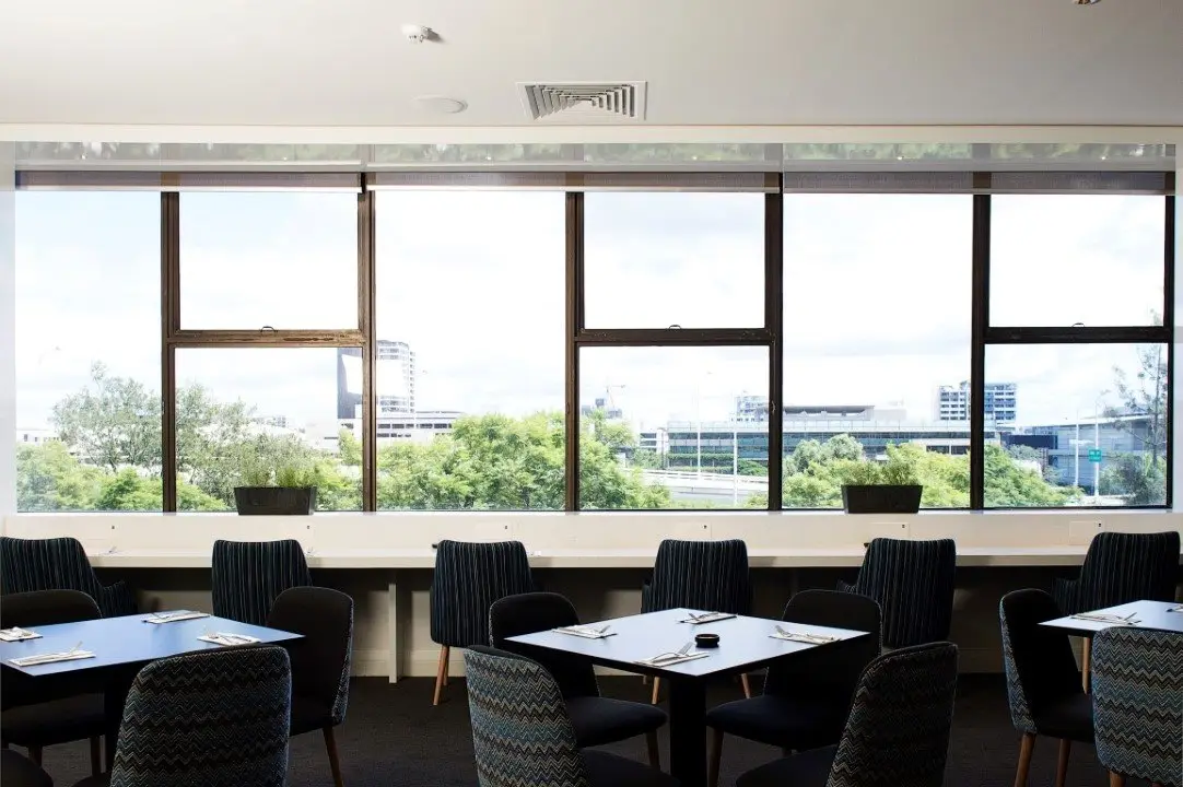 Dining tables beside the windows