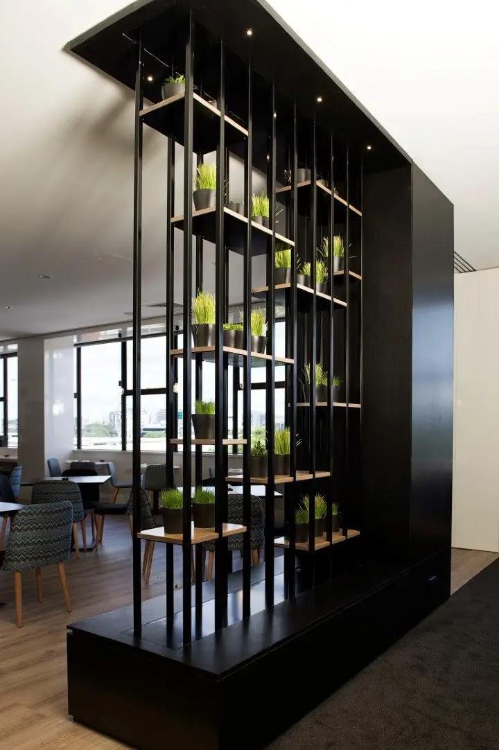 Timber batten screen with planters dividing the dining area