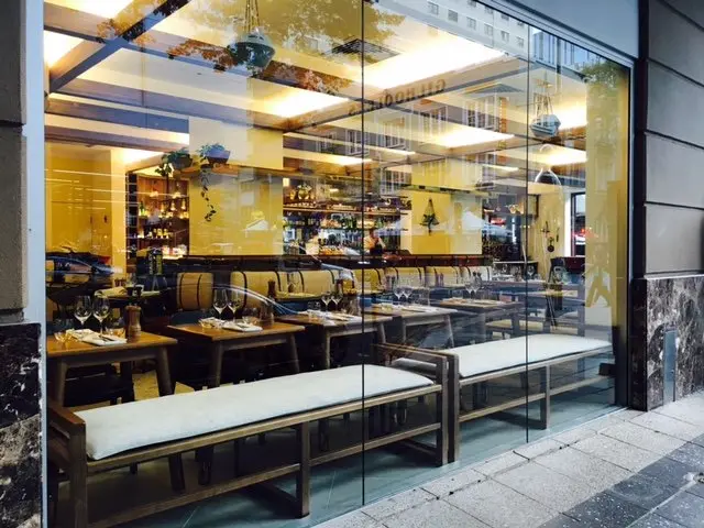 Street-side window seating at the new coffee bar